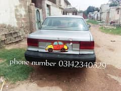 Mitsubishi Lancer model 1990 urjent sale