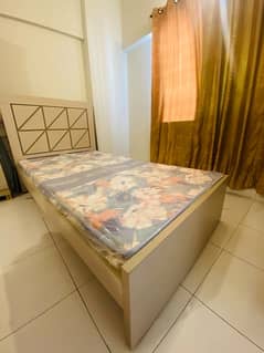 single bed with mattress