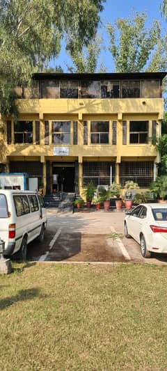 CORNER BUILDING WITH HUGE PARKING AVAILABLE FOR SALE IN F10