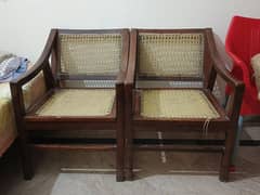 4 simple wooden chairs