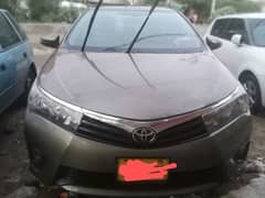 Toyota Corolla Altis 1.6.  colour is bronze Mica little mid negotiable