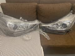 toyota Prius alpha head lights pair