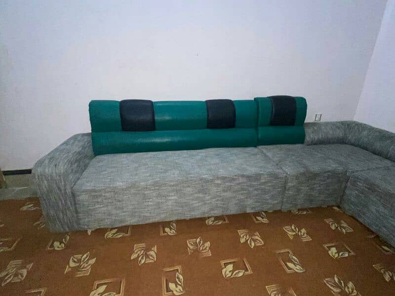 green and gray color sofa 0