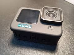 GoPro Hero 11 with charger and Telesin Battery charging cover