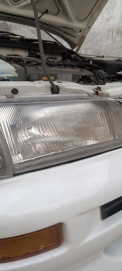 indus corolla Headlights & lace seat cover