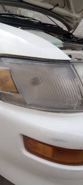 indus corolla Headlights & lace seat cover 2