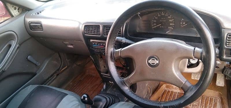 Nissan Sunny 1993.0308655437l 11