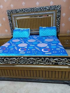 king bed with two side tables dressing table is separate