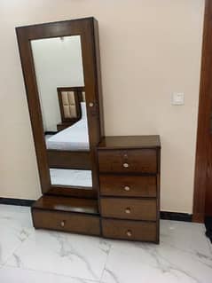 king side bed with side tables and dressing table