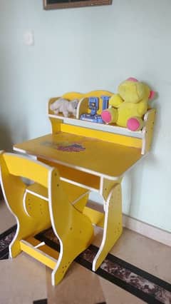 slightly used kids study table with chair