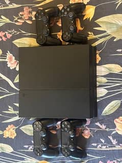 PS4 500GB excellent condition with 4 controllers and 5 games 0