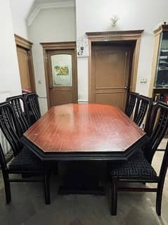 pure wood dining table with 6 chairs. . .