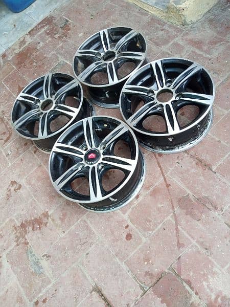 Alloy Wheels R13" . . . 4