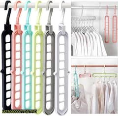 9 hole rotating clothes hanger. . . . Pack of 3