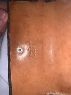 Louis Vuitton and Burberry wallet