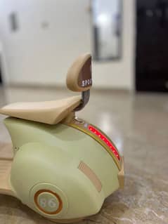 baby chargeable scooty