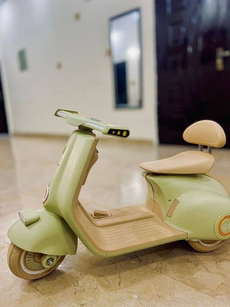 baby chargeable scooty 4