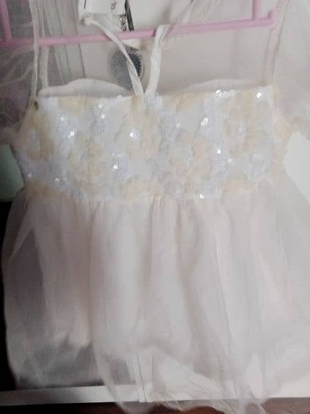 Deal of 2 fancy beautiful baby girl frocks. 4