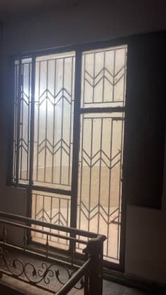 IRON DOOR WITH GLASS SIZE 8x4 ft and windows size is 1x5 ft