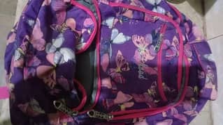 Purple butterfly design school bag