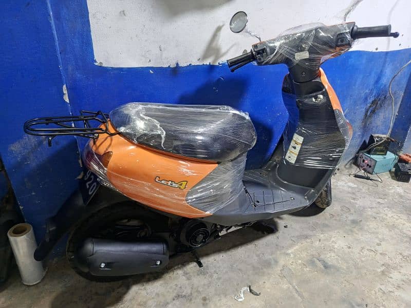 united scooty and 49cc scooty available contact at 0300 4142432 9