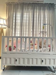 Wooden baby cot with 2 draws