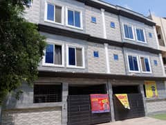 5 Marla triple story building running girls hostel for sale