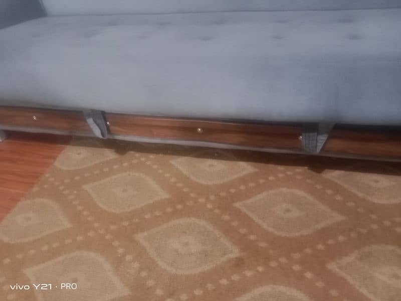 A stylish sofa com bed with a storage 0