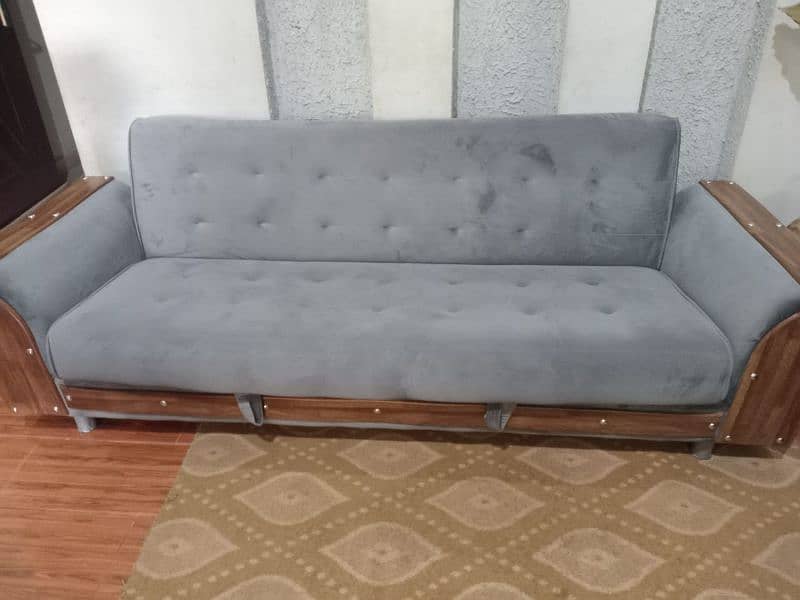 A stylish sofa com bed with a storage 4