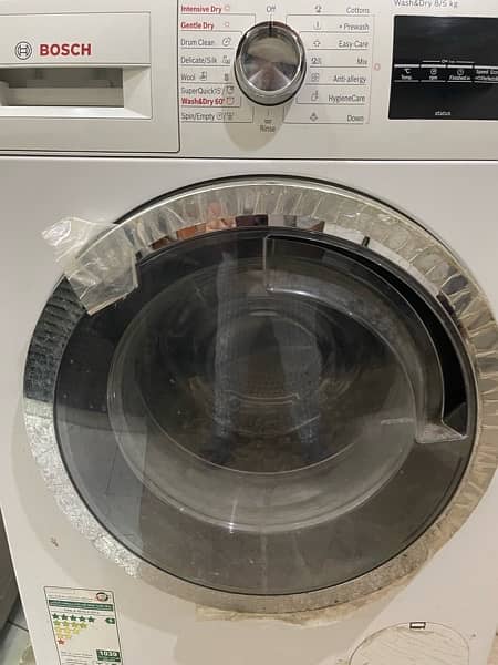 Bosch front load washer & dryer machine 1