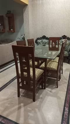 glass dining table with 6 chairs