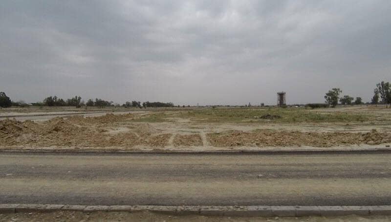 4 Marla Commercial Plot File at Investor rate Ideal Location for Sale in DHA Phase 10. 1