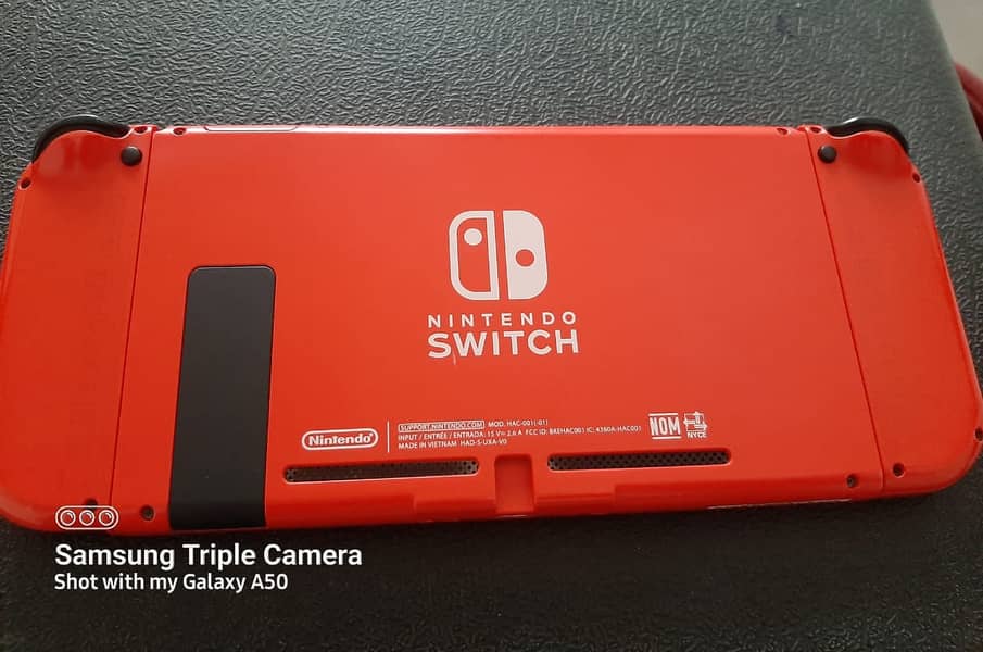 Nintendo switch V2 Dual boot Mario edition just like new with ipega 10