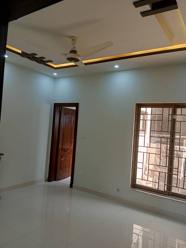 Spacious 5 Marla Brand New Designer House, 3 Bed Room With Attached Bath, Drawing Dinning, Kitchen,T. V Lounge Servant Quarter On Top With Attached Bath 2