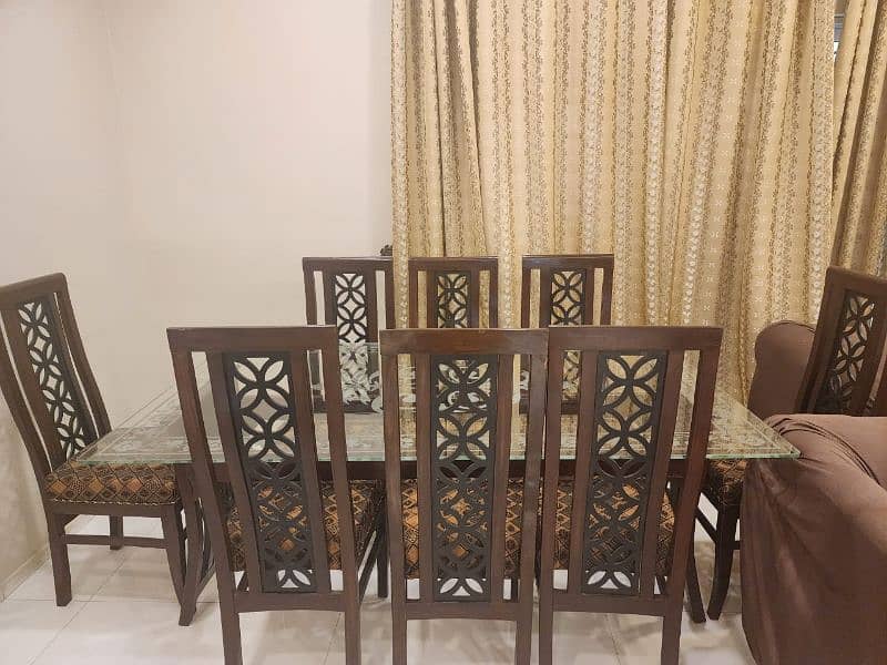 8 chairs with table not used 3