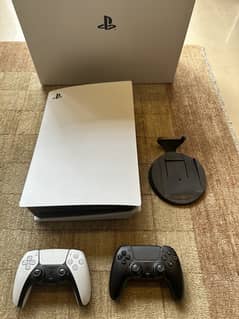 Ps5 disk console and 2 controllers