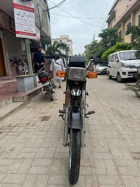 Honda 70cc passport book hai 2