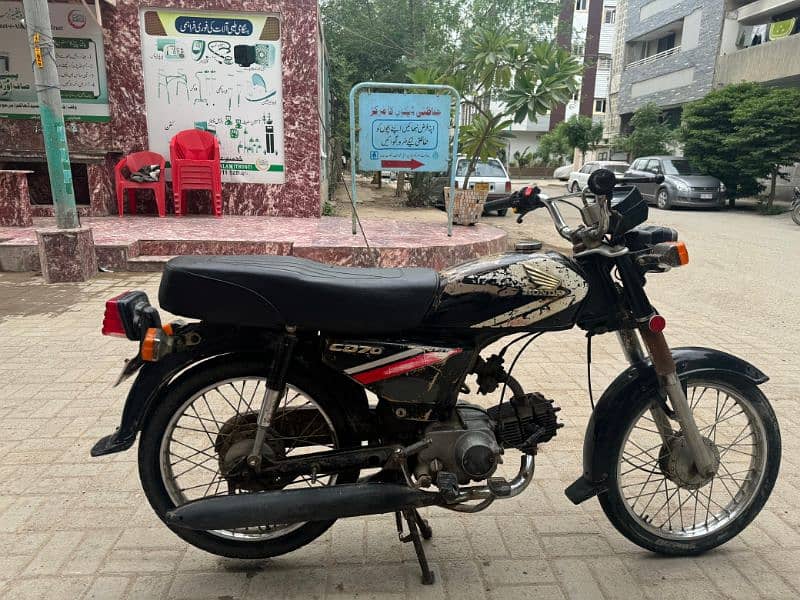 Honda 70cc passport book hai 3