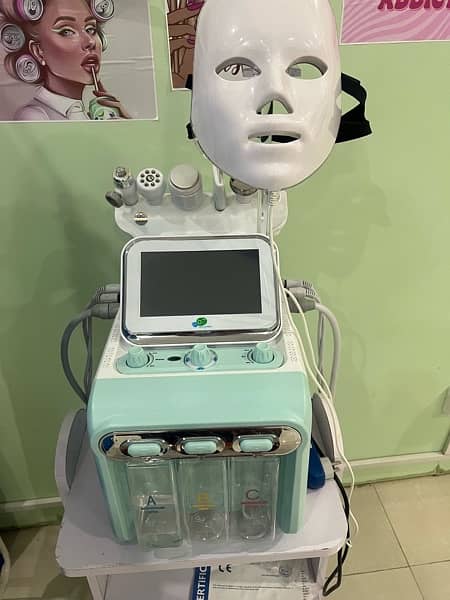 hydra facial machine with trolly n serums 6