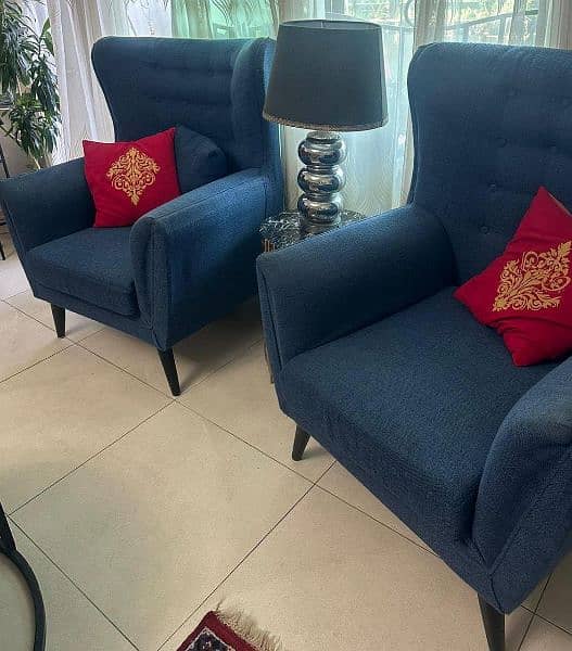 Two sofa chairs in blue colour 1