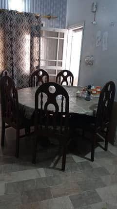 sheesham wood dining table with six chairs