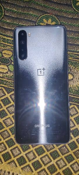 one plus Nord 5G 8+5  128 just like new 0