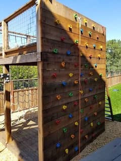 Climber/ Climbing/ wall climbing/ climbing holds/ climbing rocks/ gym