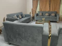 sofa set with curtains and table