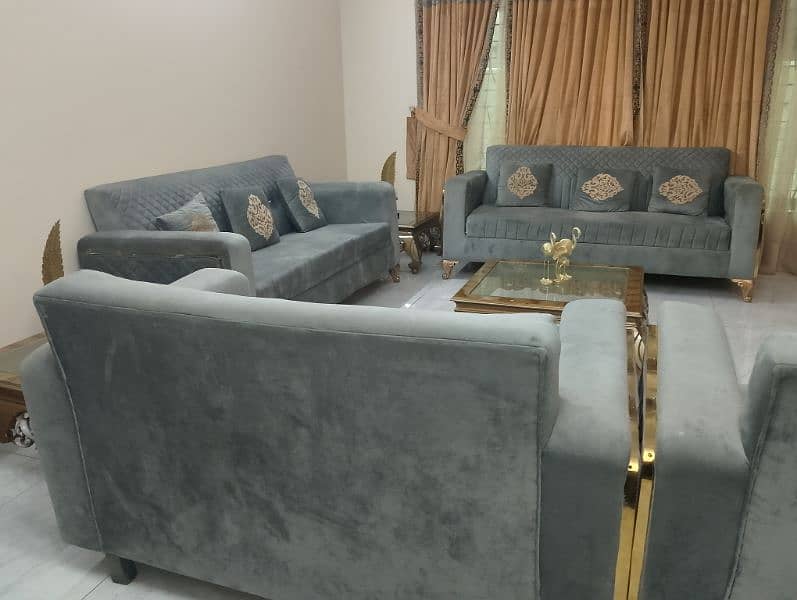 sofa set with curtains and table 0