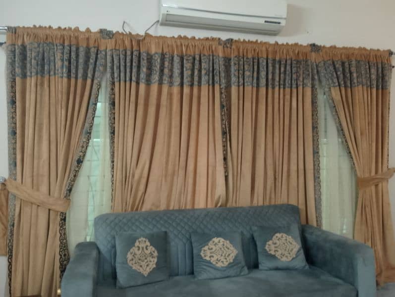 sofa set with curtains and table 1