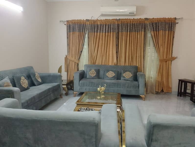 sofa set with curtains and table 2