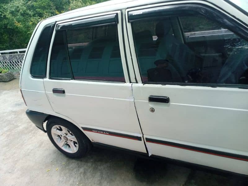 Suzuki Mehran VX at reasonable price. 11