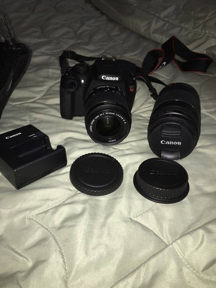 Canon 1300D urgent sale with accessories 0