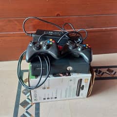 xbox 360 with two controls